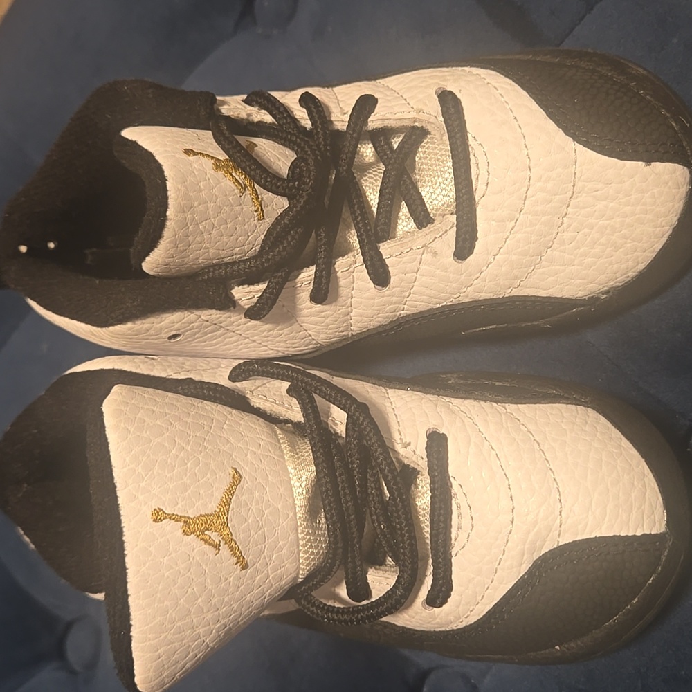 Air Jordan Black and White Sneakers with Gold Logo